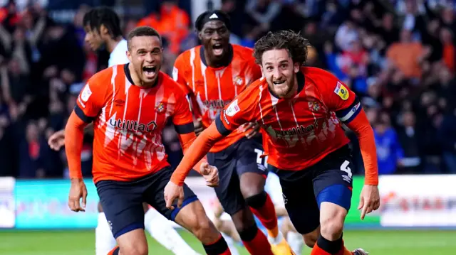 Tom Lockyer celebrates scoring for Luton