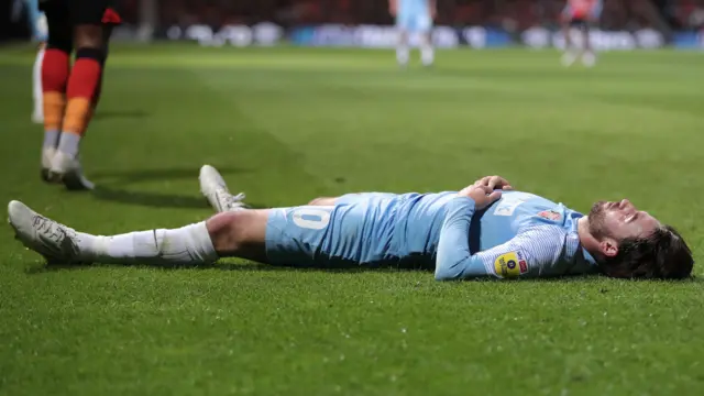 Patrick Roberts lies on the floor