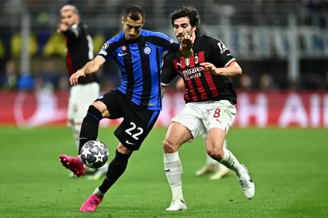 Sandro Tonali and Henrikh Mkhitaryan