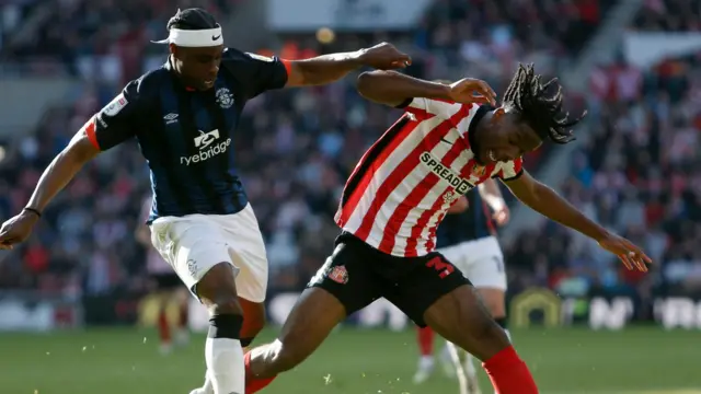 Sunderland and Luton in action during the first leg