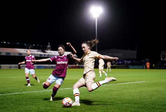 Chelsea’s Niamh Charles battles for the ball with West Ham United's Risa Shimizu