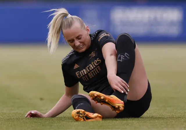 Arsenal's Stina Blackstenius reacts after sustaining an injury