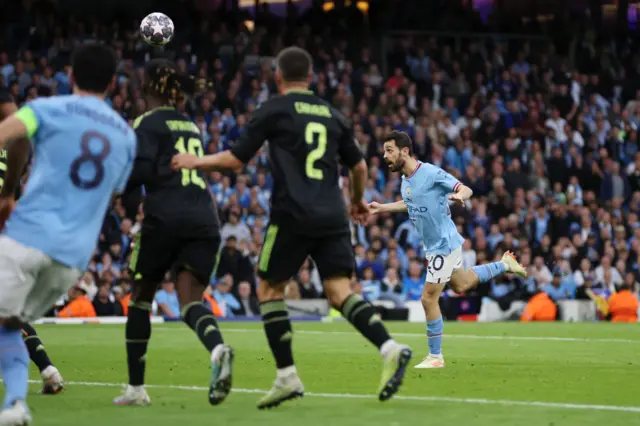 Bernardo Silva heads home his second goal