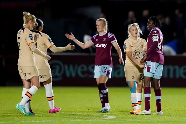 West Ham United's Kate Longhurst and Chelsea’s Jessica Carter shake hands at full time