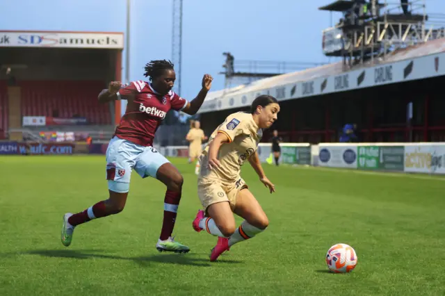 Sam Kerr of Chelsea is challenged by Hawa Cissoko of West Ham United