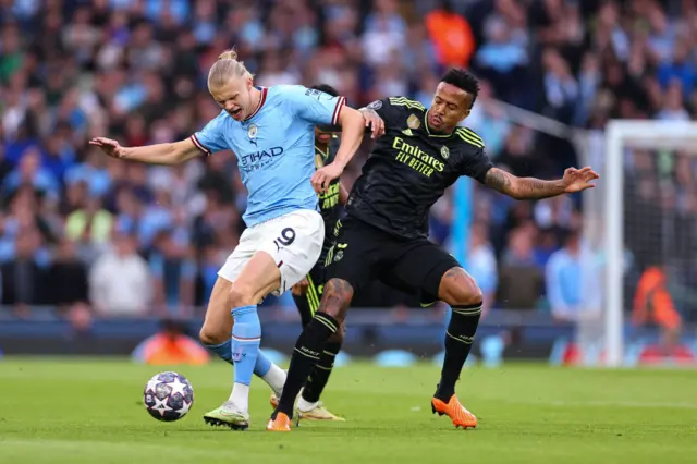 Erling Haaland and Eder Militao