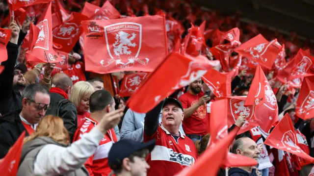 Boro fans wave flags