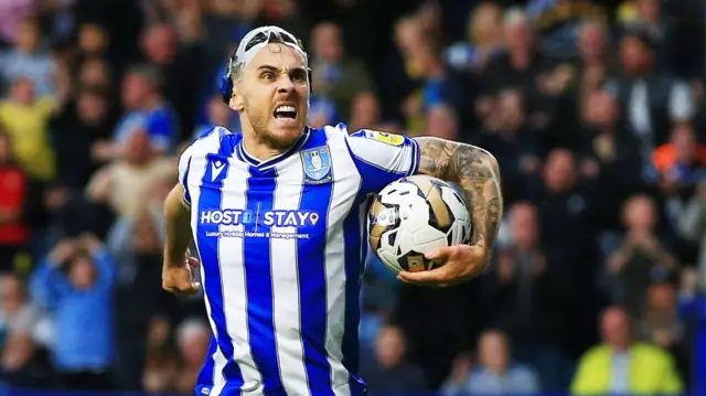 Lee Gregory celebrates scoring for Sheffield Wednesday