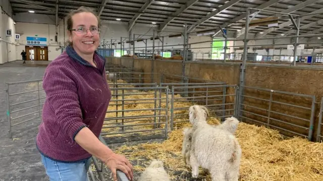 Julieann Snook-Bevis with her Angora Goats