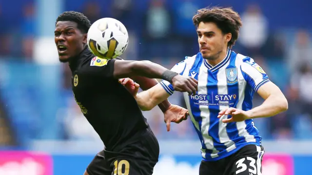 Reece James challenges for the ball