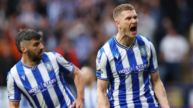 Michael Smith celebrates scoring for Sheffield Wednesday