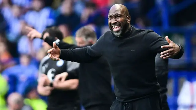 Darren Moore gestures on the touchline