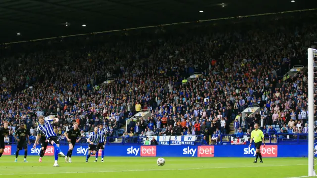 Michael Smith scores a penalty