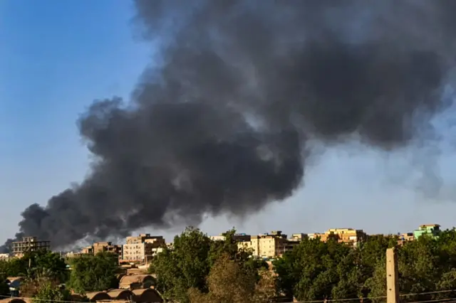 Smoke rising above Khartoum