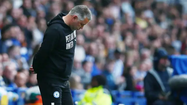 Darren Ferguson stands dejected