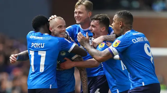 Peterborough celebrate a goal against Sheffield Wednesday