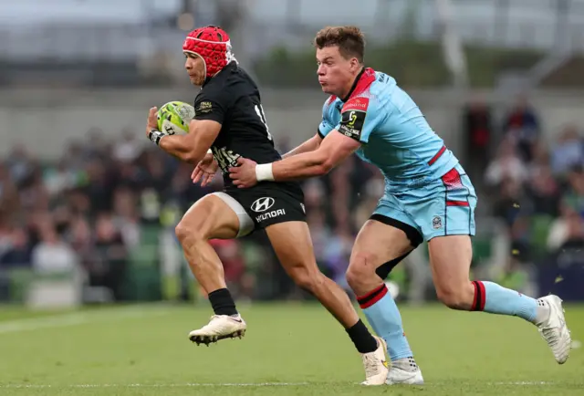 Huw Jones tackles Cheslin Kolbe