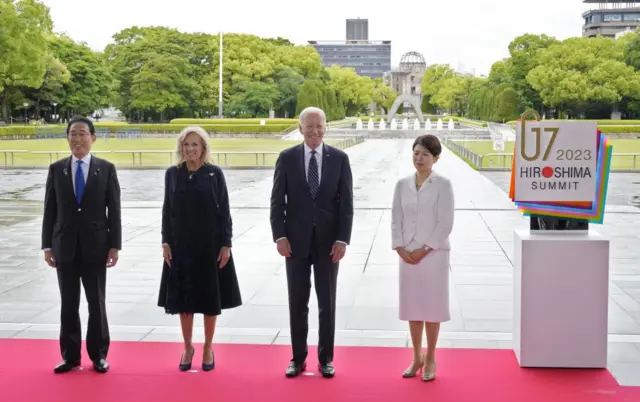 US President Joe Biden and First Lady Jill Biden standing next to Japan's Prime Minister Fumio Kishida and First Lady Yuko Kishida