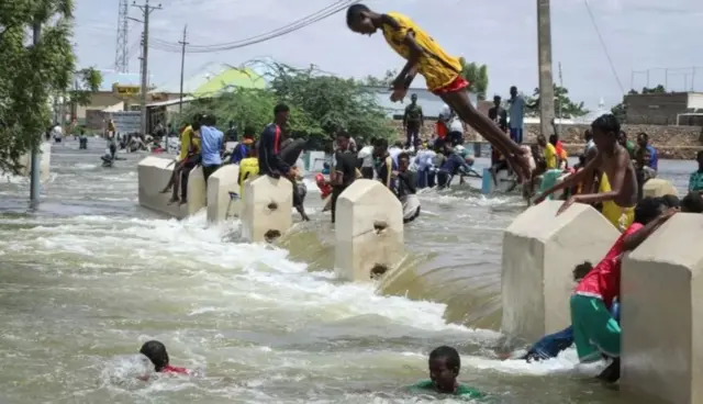 Boy diving into water