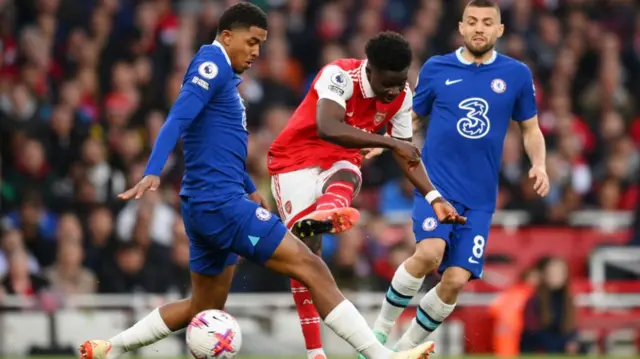 Bukayo Saka takes a shot at goal