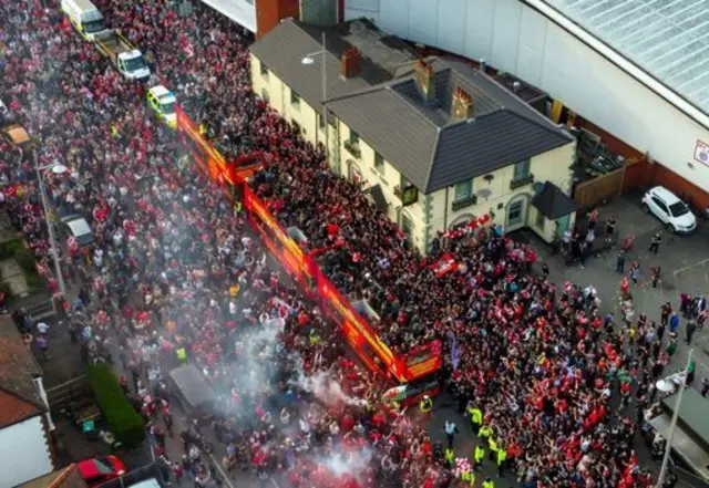 crowds outside Racecourse Ground