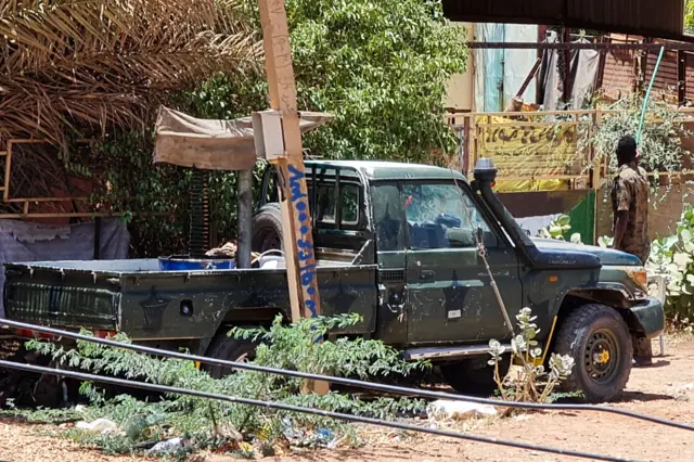 Members of security forces affiliated with the Sudanese army man a position by their vehicle in the Jabra neighbourhood of Khartoum, on May 1, 2023, as clashes continue in war-torn Sudan