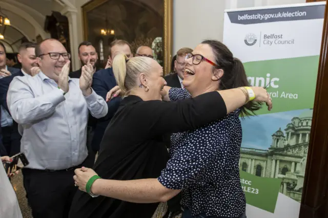 Ruth Brooks is hugged by a DUP colleague