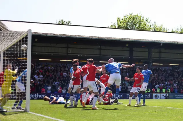 Stockport's Paddy Madden hits the bar