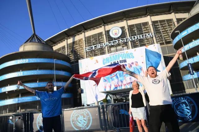 Manchester City fans celebrate their title win