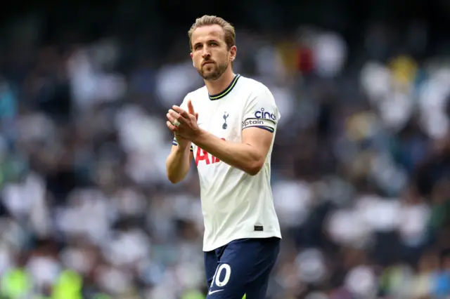 Harry Kane applauds the fans