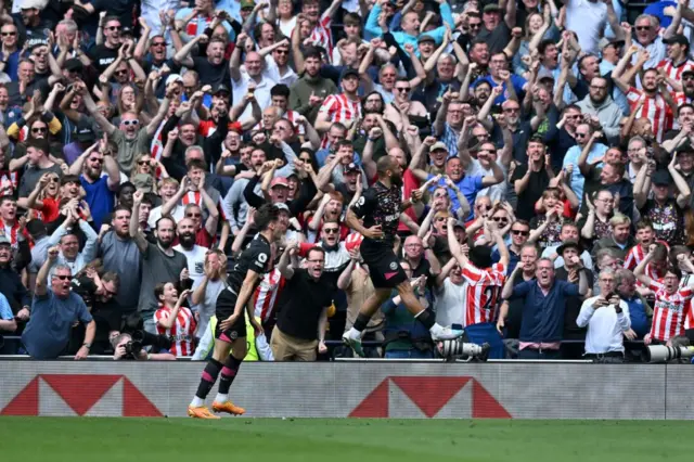 Bryan Mbeumo celebrates