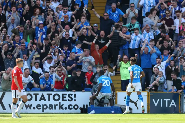 Isaac Olaofe celebrates his goal for Stockport