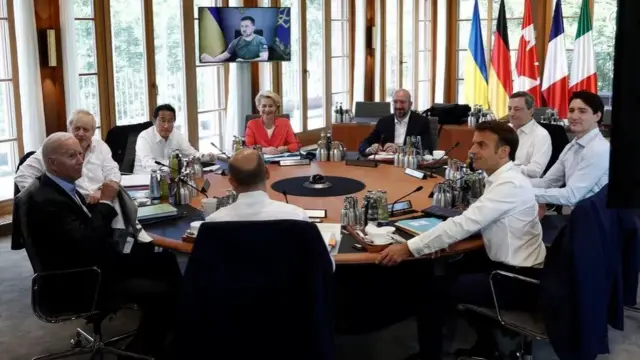 Ukraine's President Volodymyr Zelensky addressing the G7 summit via video-link in June 2022, calling for more weapons for Ukraine