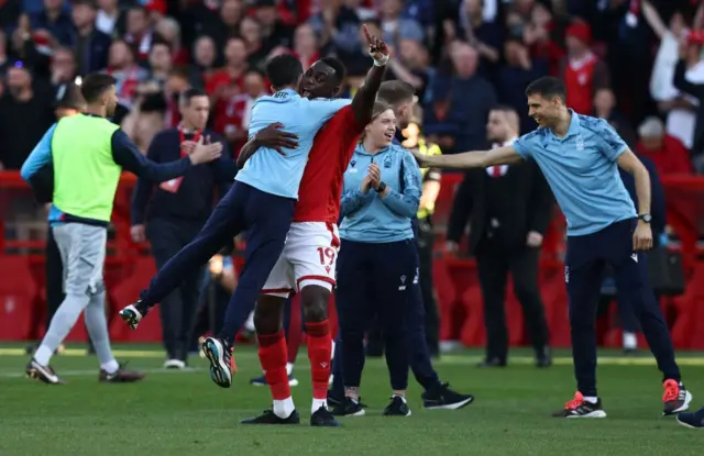 Nottingham Forest players and fans celebrate Premier League survival