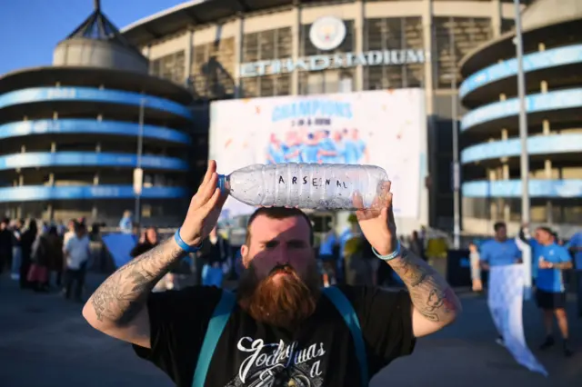 Manchester City celebrating outside the Etihad