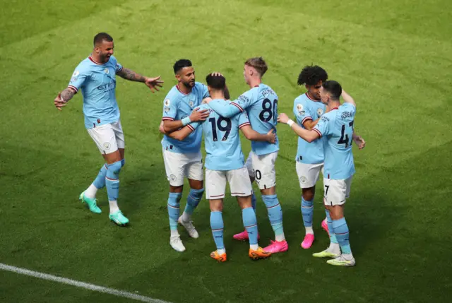 Julian Alvarez celebrates with teammates