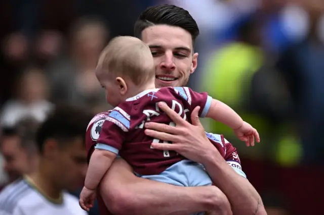 Declan Rice with his son