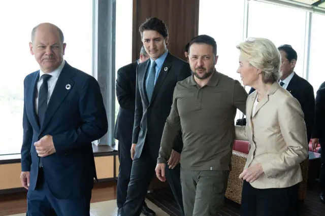 Zelensky arrived earlier with the other G7 leaders. He's pictured here with Germany's Olaf Schulz, Canada's Justin Trudeau and European Commission President Ursual von der Leyen