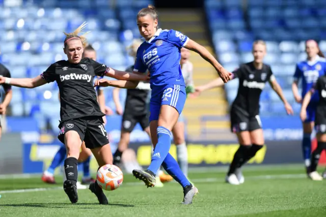 Leicester's Amelie Plumptre shoots towards goal under pressure.