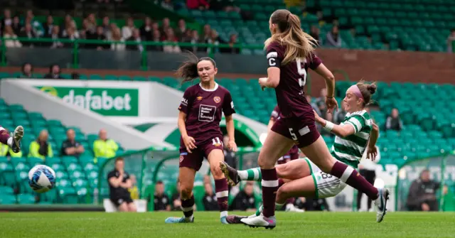 Caitlin Hayes falls as she strikes low to give Celtic the lead