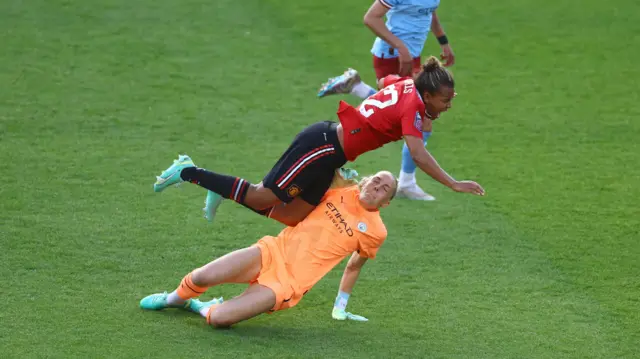 Ellie Roebuck tackles Nikita Parris