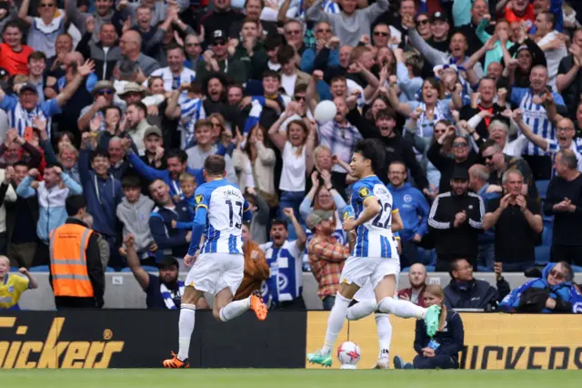 Pascal Gross celebrates after scoring