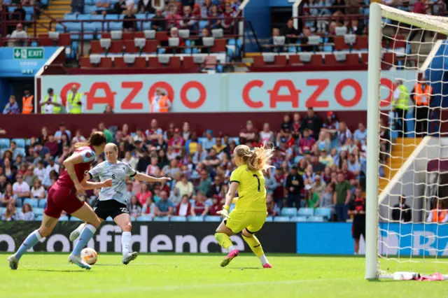 Natasha Dowie scores