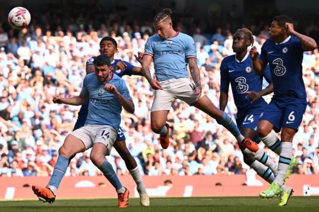 Kalvin Phillips heads towards goal