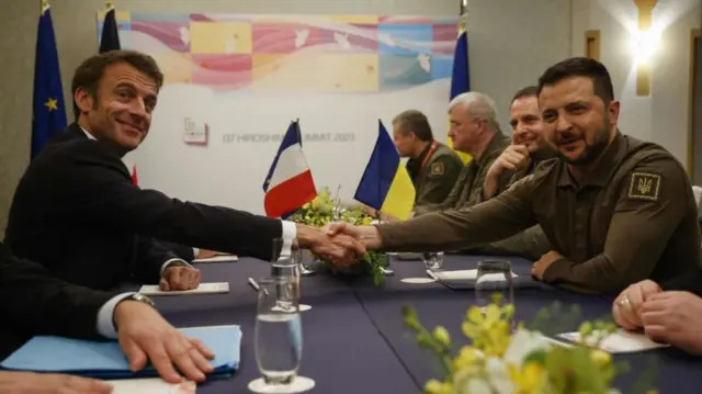 Emmanuel Macron and Volodymyr Zelensky at the G7 Summit