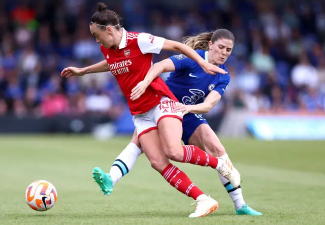 Caitlin Foord and Maren Mjelde battling for the ball