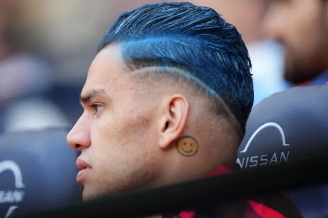 Ederson with blue hair