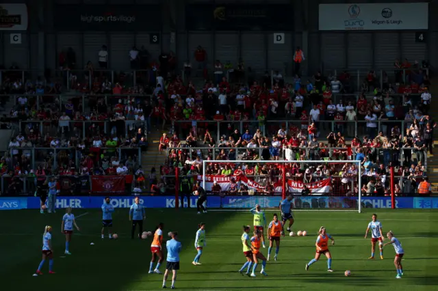 Man City warm up ahead of the Manchester derby.