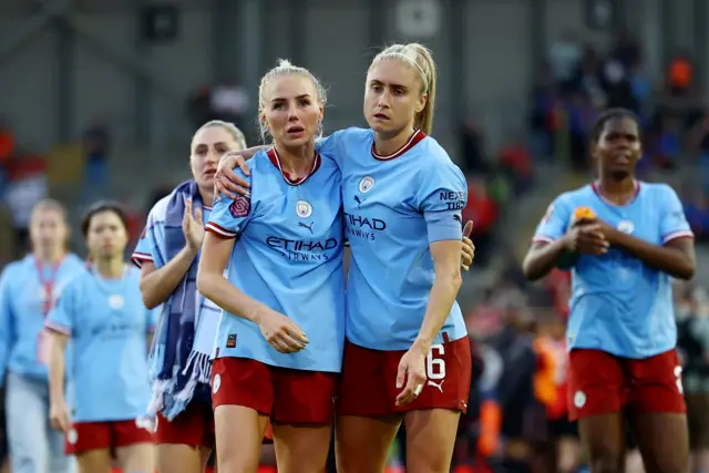 Manchester City's Alex Greenwood and Steph Houghton look dejected after the defeat to Man Utd