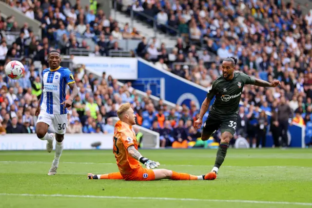 Theo Walcott scores which is later ruled out for offside